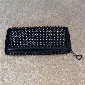 GENNI studded black snap clutch with rhinestones
